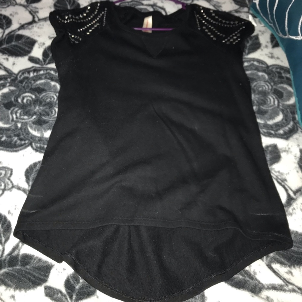 Black top with silver metal on shoulders